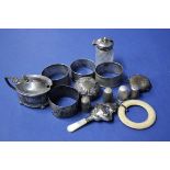 Four silver napkin rings; together with other silver and metal items.