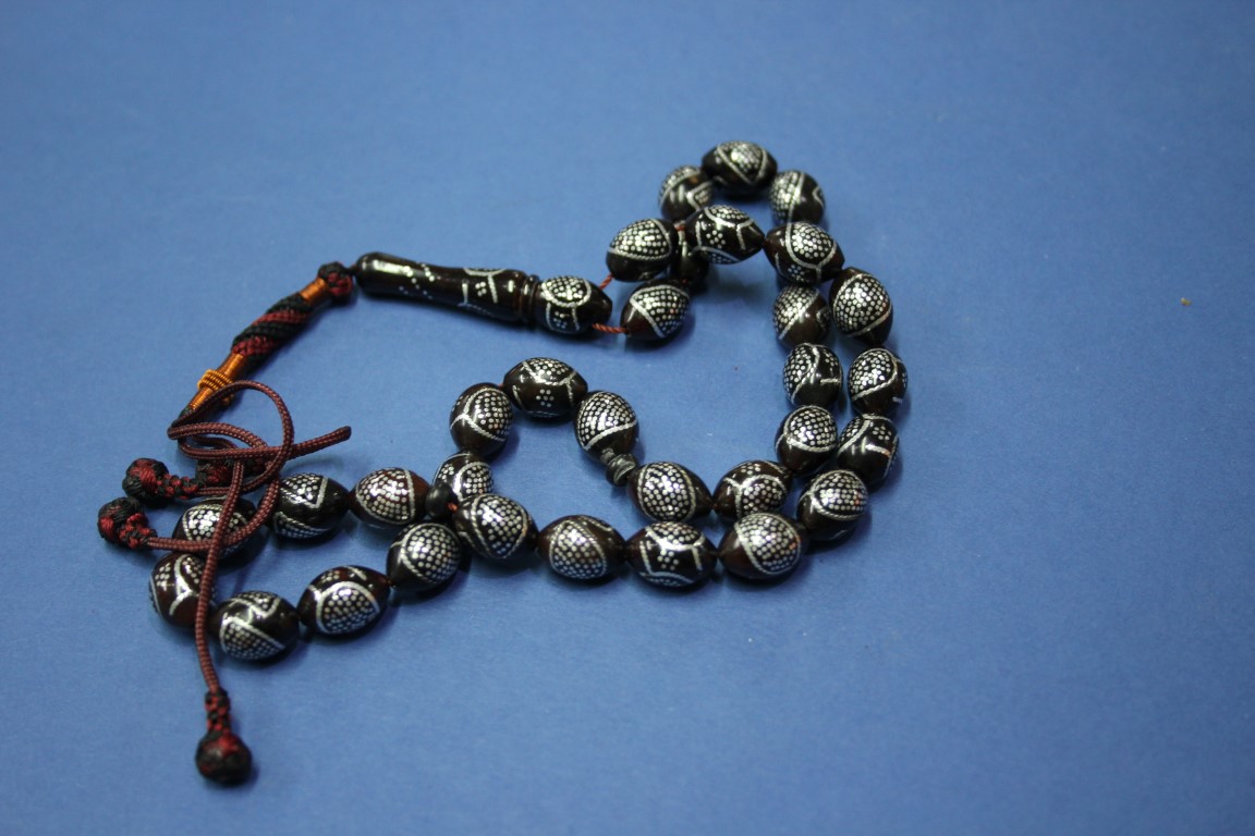 A string of Turkish silver inlaid kuko wood prayer beads. - Image 3 of 3
