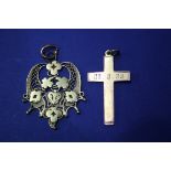 A 9ct gold cross, 2.6g; together with an unmarked filigree pendant, 6.6g.