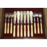 A cased set of six silver plated fish knives and forks;