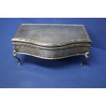 An Edwardian silver jewellery casket, by W Comyns, London 1909, 15cm.