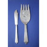 A Georg Jensen Pyramid fish slice and a matching fish knife, import marks London 1936 and 1937,