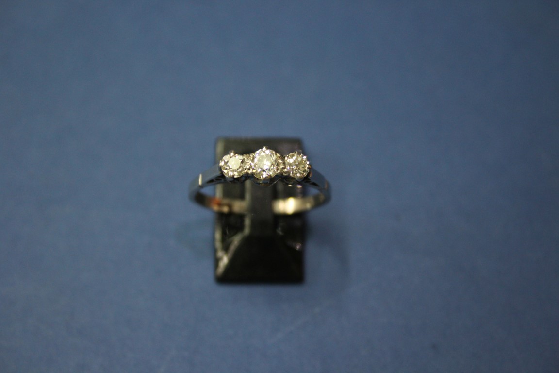 A platinum three stone diamond ring, 0.75ct approx. - Image 3 of 11