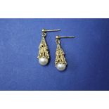 A pair of 9ct gold and pearl drop earrings, 5.7g in total.