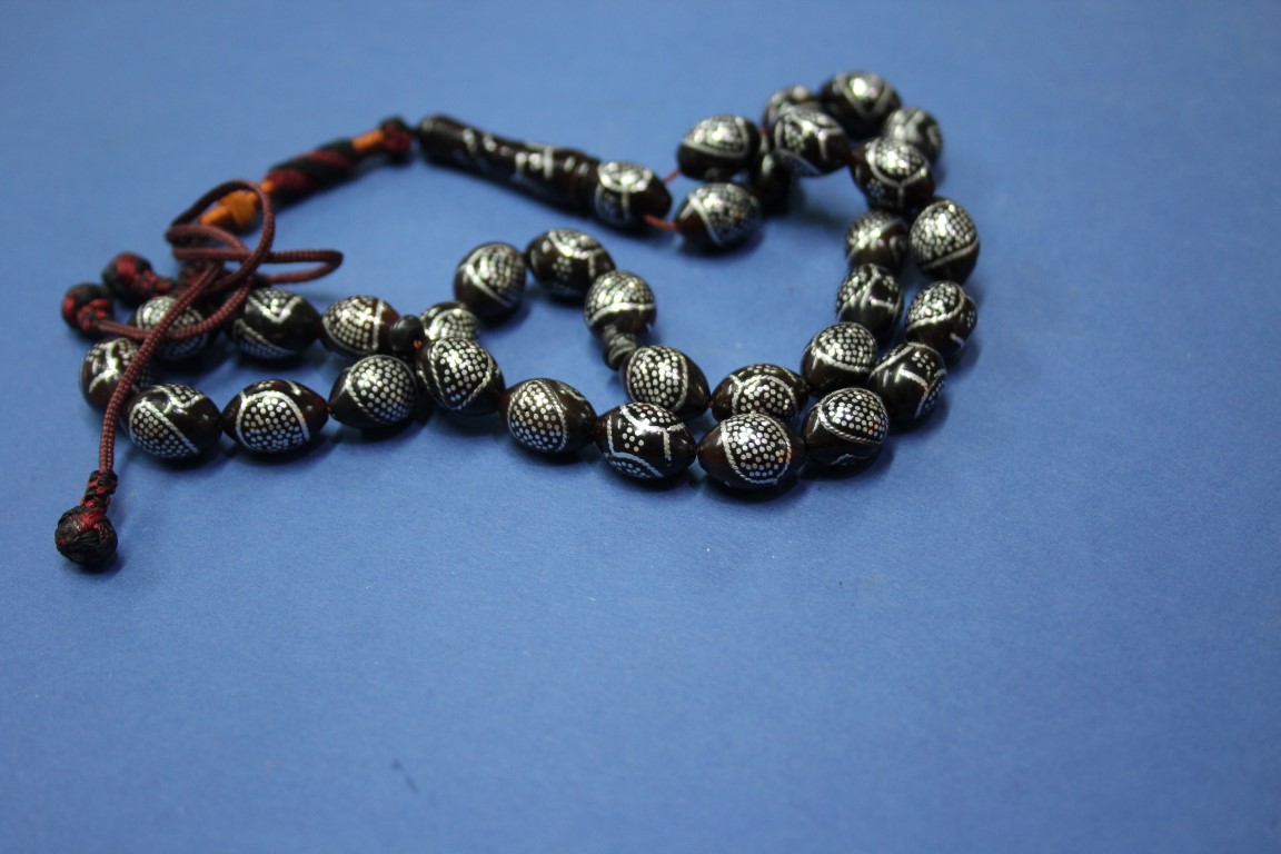 A string of Turkish silver inlaid kuko wood prayer beads. - Image 2 of 3