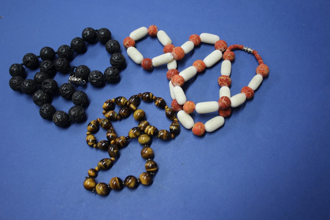 An Icelandic volcanic lava beaded necklace; together with a string of tiger's eye beads; - Image 2 of 3