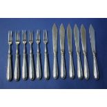 A set of six sterling silver dessert knives and forks, having beaded decoration to handles.