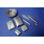 Two silver vesta cases; together with a silver matchbook case;