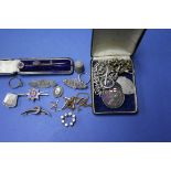 A small collection of silver and other metal jewellery,