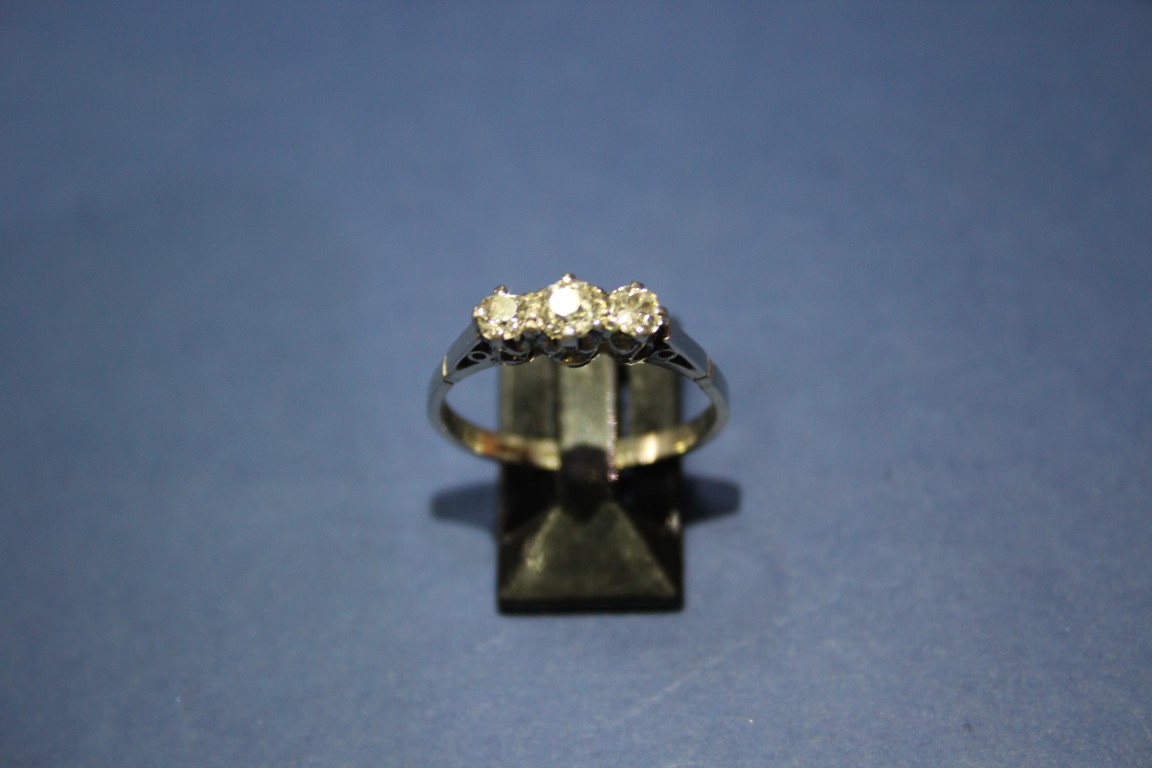 A platinum three stone diamond ring, 0.75ct approx. - Image 6 of 11