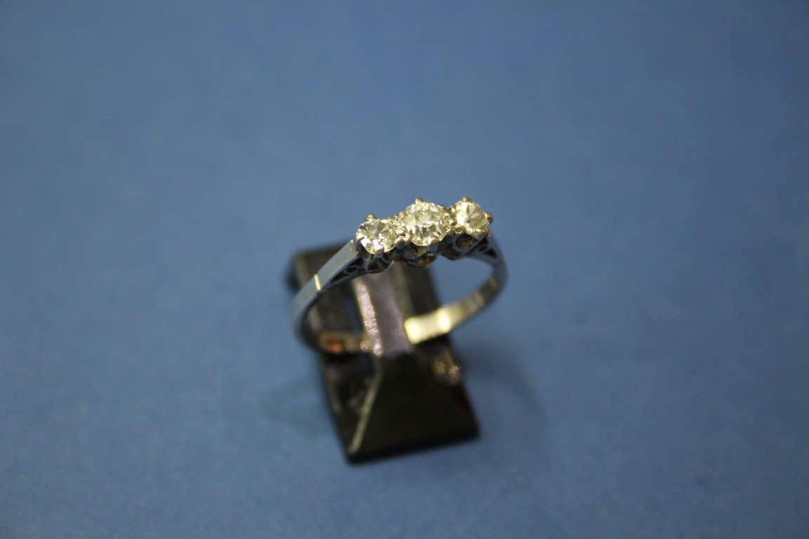 A platinum three stone diamond ring, 0.75ct approx. - Image 4 of 11