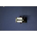 An 18ct white gold aquamarine ring, emerald cut. Condition Report: Ring size K.