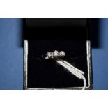 A platinum three stone diamond ring, 0.75ct approx.