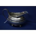 A George IV silver milk jug, by Richard Pearce, London 1825, 132g.