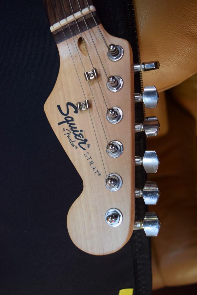 A Fender Squier Strat electric guitar, in padded bag; together with Squier SP10 amp. - Image 2 of 5
