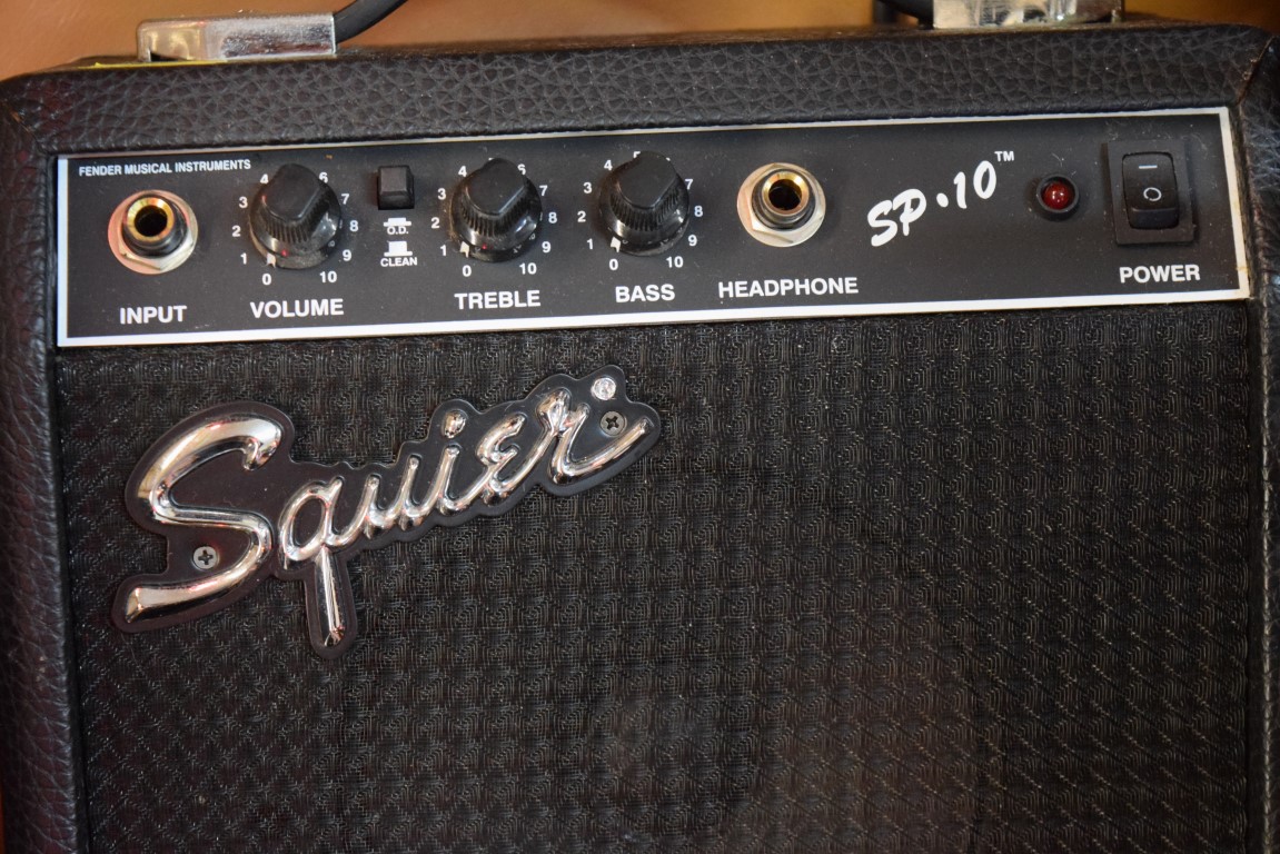 A Fender Squier Strat electric guitar, in padded bag; together with Squier SP10 amp. - Image 5 of 5