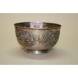 A Chinese silver circular bowl, by Woshing, Shanghai, with four embossed panels, 9.