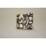 A Japanese carved ivory netsuke of Shishimai lion dancers, 18th century,