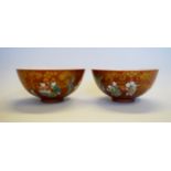 A rare pair of Chinese large coral ground 'boys' bowls, Jiaqing seal mark and of the period,