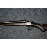 An old James & Reynolds 12 bore double barrel shotgun, deactivated.