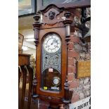 A Vienna style walnut wall clock, 85cm high.