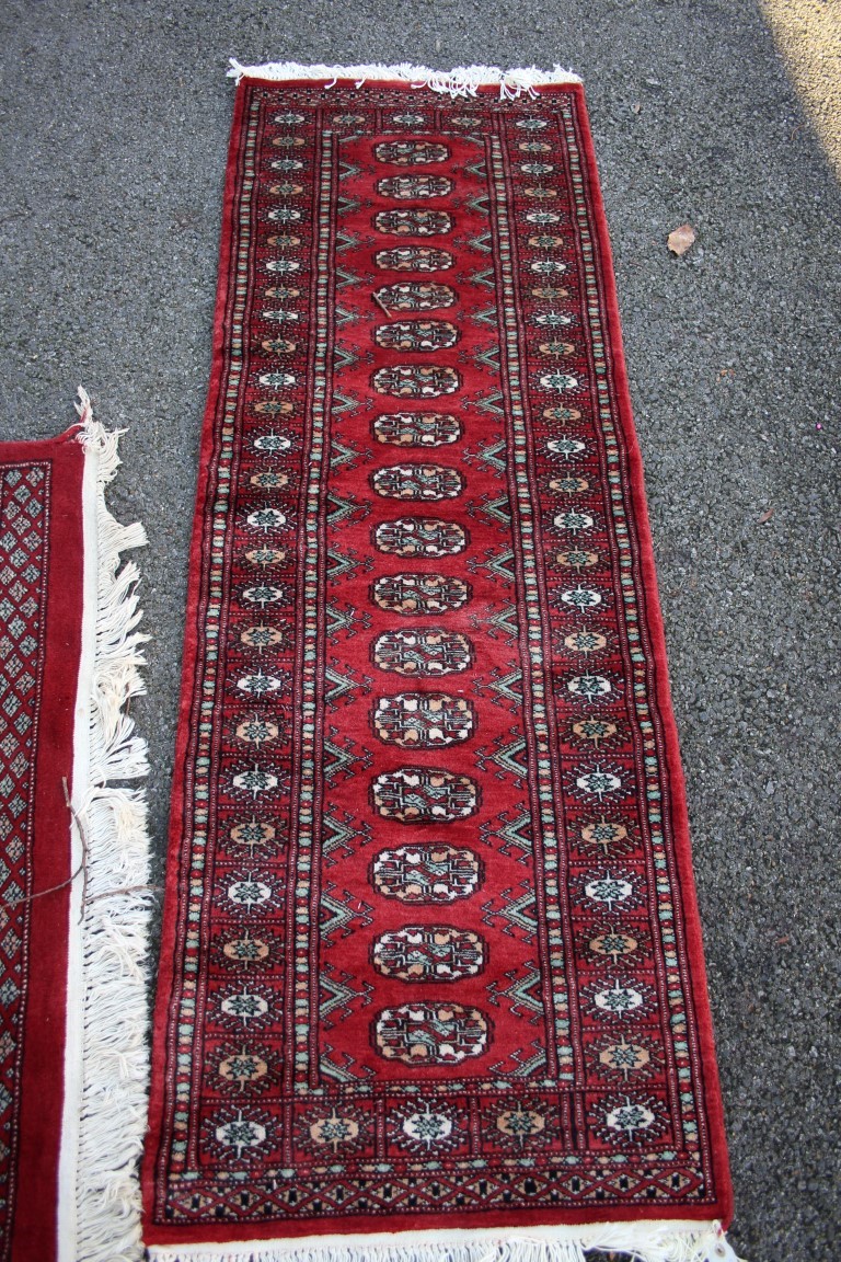 Two Pakistan Bokhara design rugs; together with a Pakistan runner; - Image 5 of 9