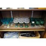 A set of six 19th century green wine glasses; together with two further sets of glasses.