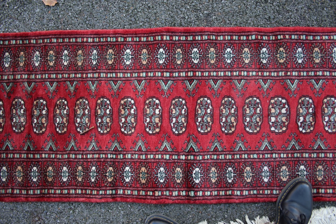 Two Pakistan Bokhara design rugs; together with a Pakistan runner; - Image 6 of 9