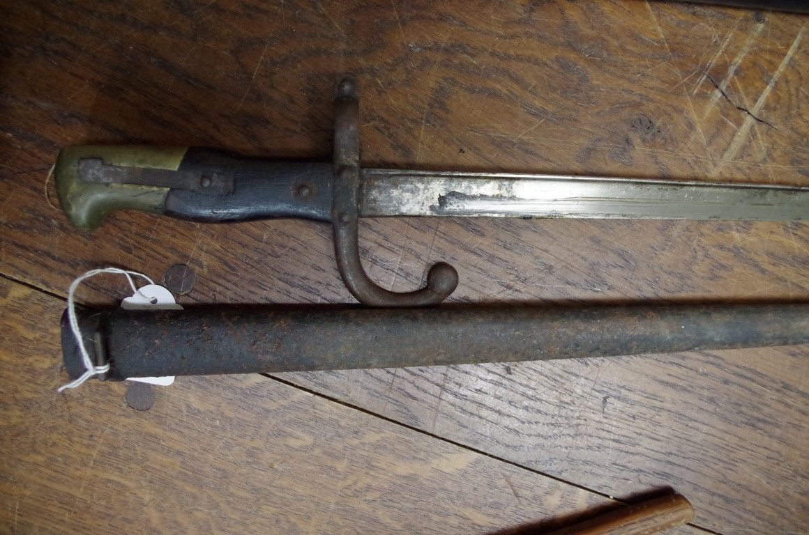 An antique French bayonet and scabbard. - Image 2 of 3