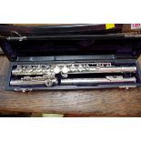 A concert flute by A&W, No.59055, in hard case.