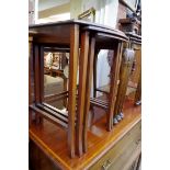 A nest of three mahogany tables, largest 46cm wide.