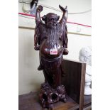 A Japanese carved wood figural lamp base, 52.5cm high.