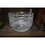 An antique cut glass bowl, wheel engraved with golf clubs, 20.5cm wide.