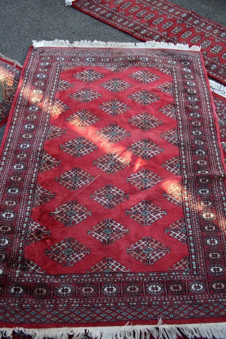 Two Pakistan Bokhara design rugs; together with a Pakistan runner; - Image 7 of 9