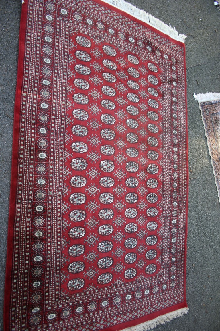 Two Pakistan Bokhara design rugs; together with a Pakistan runner; - Image 2 of 9