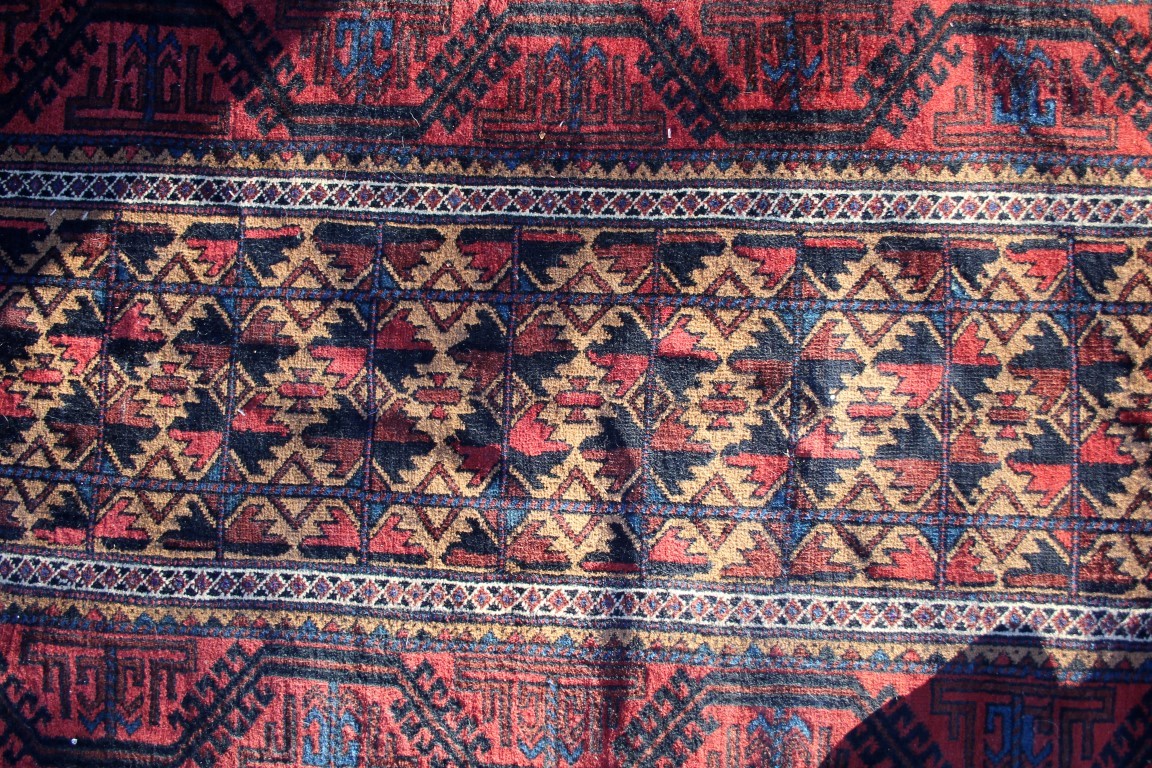 A Beluchi long rug, having allover geometric design on camel ground field. - Image 6 of 9