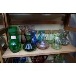 A collection of glass hyacinth bulb vases.