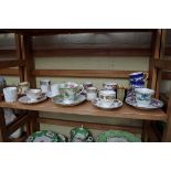 A collection of English porcelain cups and saucers.