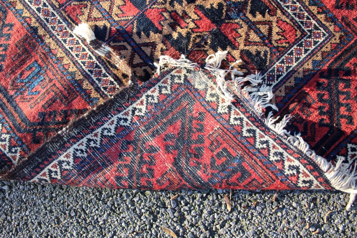 A Beluchi long rug, having allover geometric design on camel ground field. - Image 5 of 9
