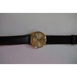 A vintage 9ct gold Longines gentleman's mechanical wristwatch.