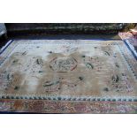 A large Chinese carpet, having central dragon medallion surrounded by a further eight dragons.