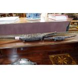 Ethnographica: two West African carved hardwood crocodiles, largest 54cm long.