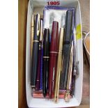 A collection of pens, to include a Parker Slimfold.