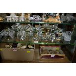 A collection of crystal and glass figures.