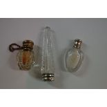 A hobnail cut glass tapered scent flask, having metal screw top,