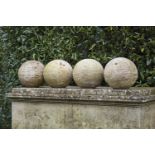 Architectural/Finials: A set of four composition stone ballsmodern36cm.; 14ins diameter
