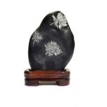 Mineral: A Chrysanthemum stone on wooden base41cm.; 16ins overall