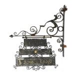 A substantial wrought iron and sheet metal bracket with hanging signdated 1880170cm.; 67ins high