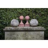 Architectural/Finials: A pair of carved stone gatepier balls40cm.;16ins diameter together with a