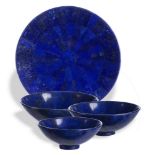 Mineral: A suite of three Lapis Lazuli bowlsAfghanistanthe largest 22cm.; 9ins diameter